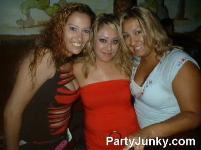 Guests posing for the camera at Coyote Ugly Bar & Grill