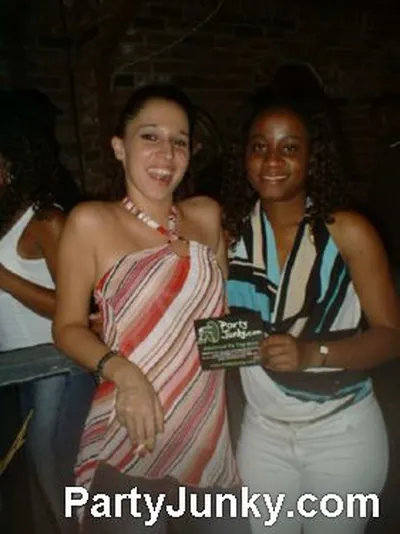 Guests posing for the camera at Coyote Ugly Bar & Grill