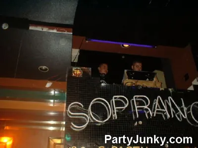 DJ at the turntables at Sopranos Night Club, Aug 13, 2004