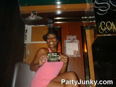 Guests posing for the camera at Sopranos Night Club, Aug 13, 2004