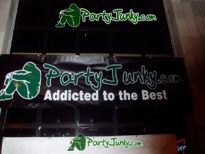 Venue sign and event banner at the Suga Free concert, Dec 14, 2003