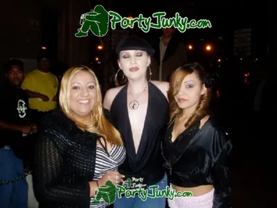 Guests posing for the camera at the Suga Free concert, Dec 14, 2003