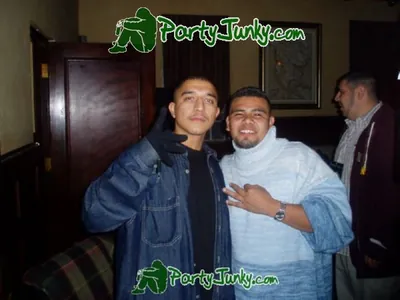 Guests posing for the camera at the Suga Free concert, Dec 14, 2003